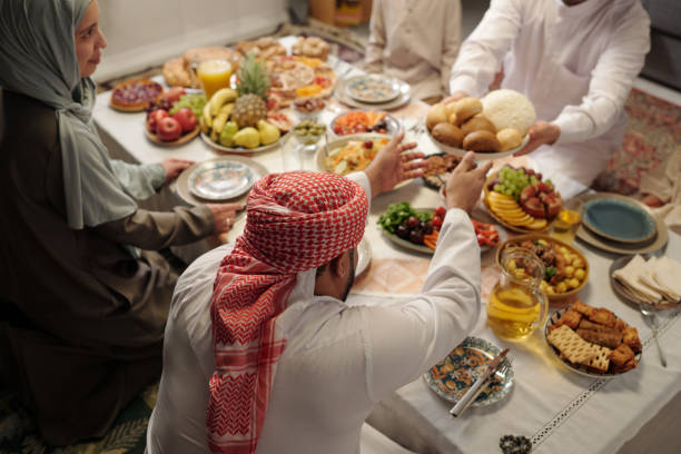istock Muslim Family Having Festive Dinner 2129311057