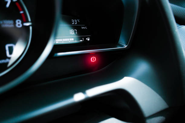 istock Brake warning light illuminated on instrument panel in a car 2129317854