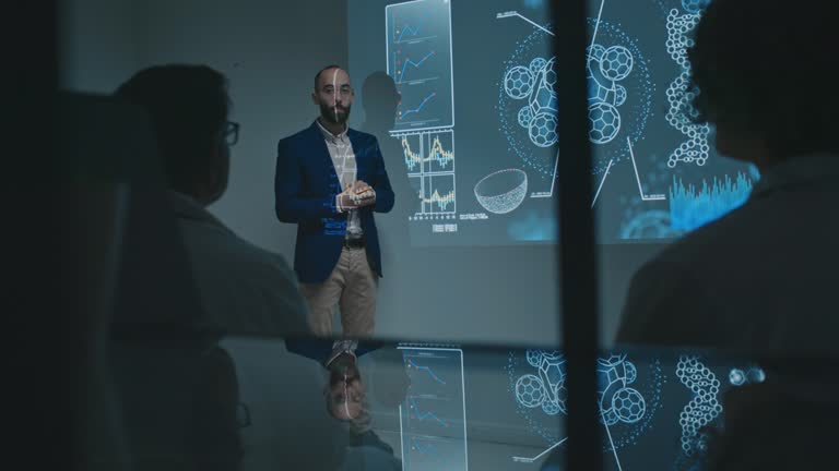 Male Scientist Presenting Research at Conference and Doctors Clapping