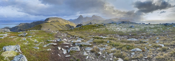 view from a rocky plateau on peak mountain and the sea  in Norway - nordland, vesteralen archipelago, Langoya island