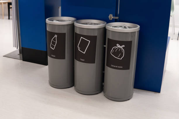 istock A row of three recycling bins lined up next to each other indoors. 2129332497