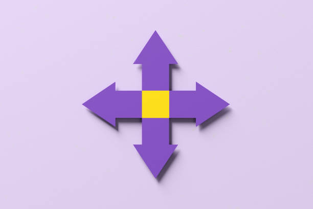 istock Four Arrows in Opposite Directions on Purple Background 2129342196