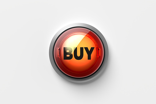 The word buy on a push button isolated on white background. Online shopping concept. 3D render.