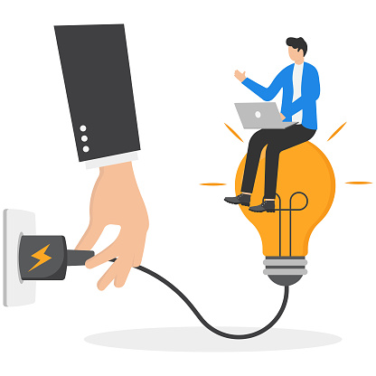 Sparking idea for working, mentorship to reduce burnout in the workplace, motivation and inspiration concept. Manager hands plug in an idea light bulb for employees to continue working.