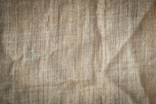 istock brown sackcloth texture background, crumpled burlap fabric textile for design 2129382859