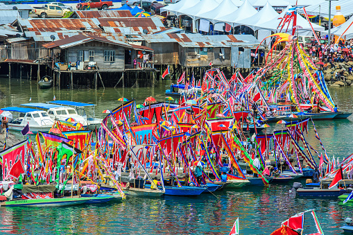 Semporna Sabah, Malaysia - Apr 22, 2017: Traditional Bajau's boat called Lepa-Lepa decorated with colorfull Sambulayang flag during Regatta Lepa in Semporna.