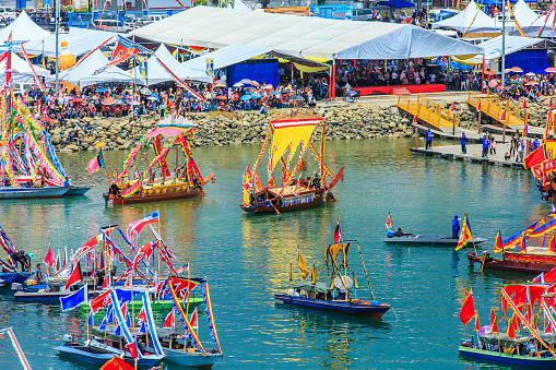 Semporna Sabah, Malaysia - Apr 22, 2017: Traditional Bajau's boat called Lepa-Lepa decorated with colorfull Sambulayang flag during Regatta Lepa in Semporna.