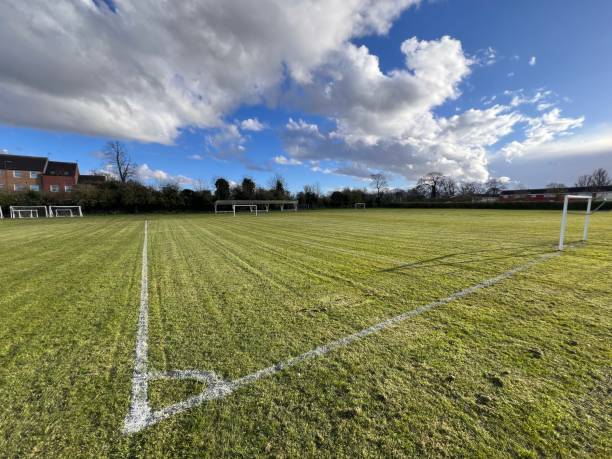 istock Freshly cut and marked grassroots football pitch 2129450643