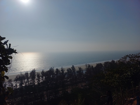 Panoramic view of the setting sun over the vast sea surface. The world largest sea beach Cox's Bazar Bangladesh