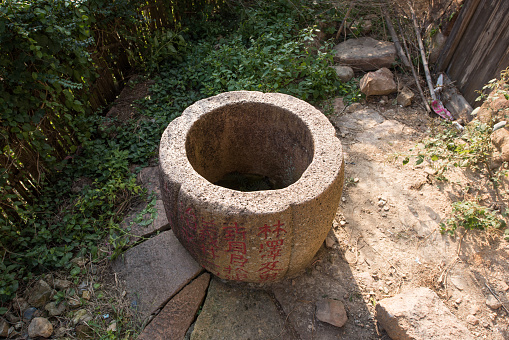 An ancient well made of stone material
