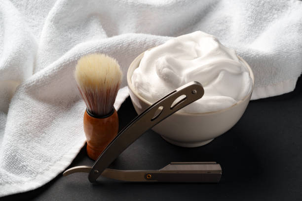 istock Traditional Wet Shaving Gear Arranged on a Dark Background With Morning Light 2129497114