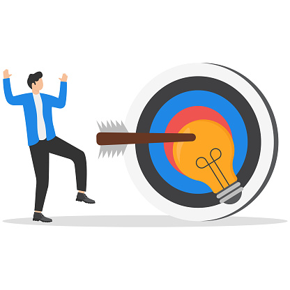 Successful business idea for target, right solution to complete project, winning marketing strategy concept. Businessman shoot arrow precisely at center of target with light bulb idea.