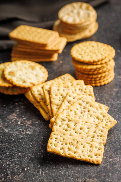istock Pile of Crackers on Kitchen Counter 2129503305