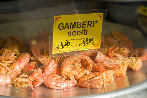 Genoa in Liguria Italy  . Fried shrimps in bar.