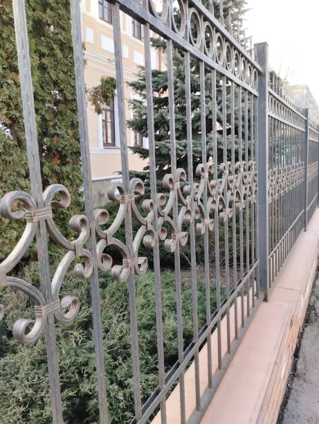 istock metal building fence 2129535544