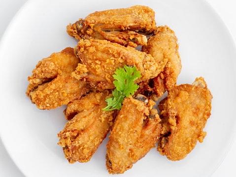 fried chicken wings on white background