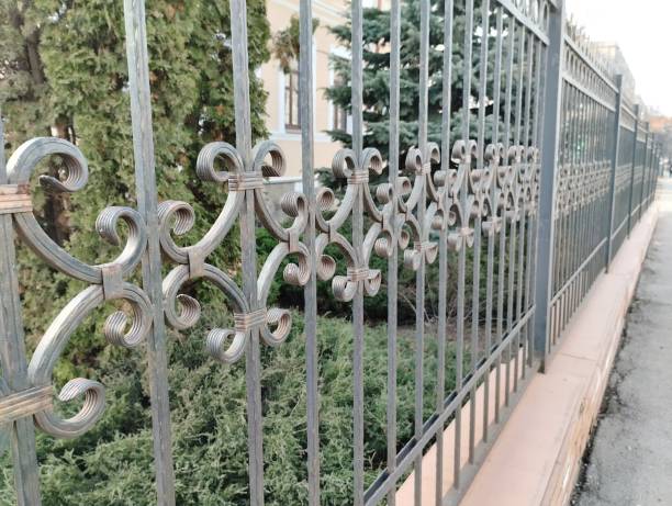 istock fence fence near the building 2129539798