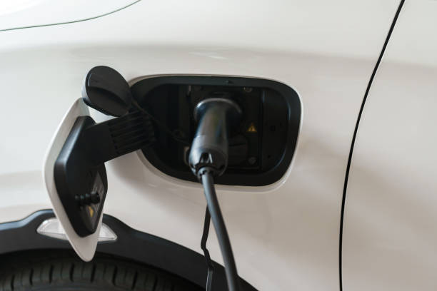 istock power cable charging environmentally friendly zero emission electric car at home 2129557516