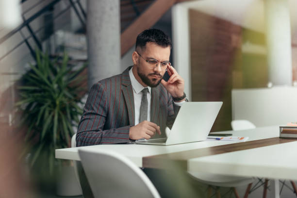 istock Businessman working on laptop in the office 2129563907