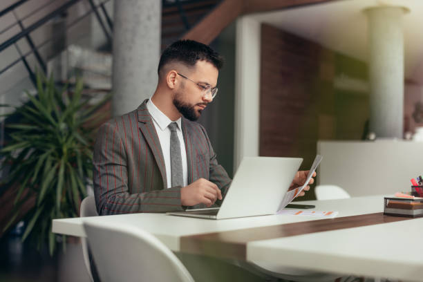 istock Businessman working on laptop in the office 2129564419