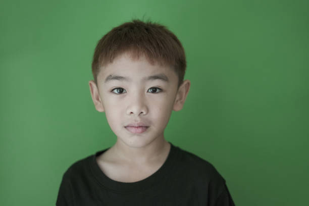 Portrait Boy on Green wall
