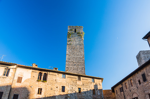 San Gimignano, in Tuscany, Italy, is famous for its medieval towers, historic center, and Vernaccia wine. It's a charming town that offers a glimpse into medieval Italy's beauty and culture.