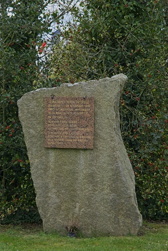 Marker Stone with letter in the ground.