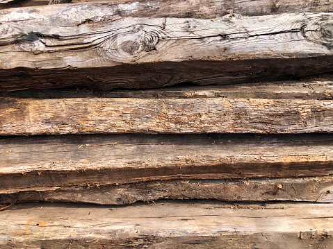 Wooden background with pile of planks