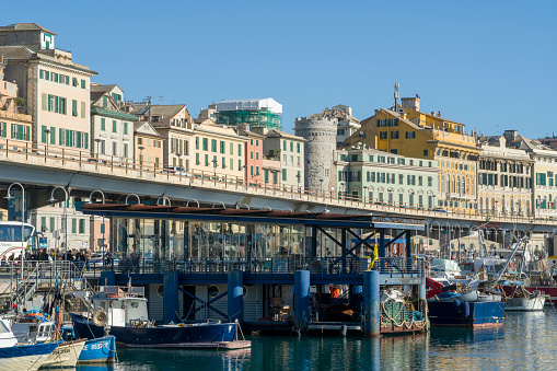Genoa in Liguria Italy on October 30, 2023 buildings in the promenade. Old fish market.