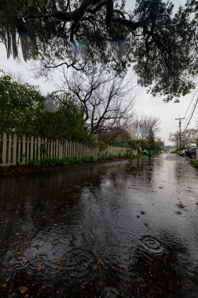 istock Raindrops in a flooded alley 2129650955