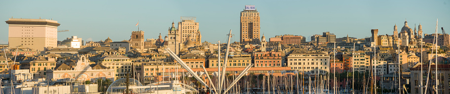 Genoa in Liguria Italy on October 30, 2023 Aerial view of the city from a cruise ship moored at harbor sunset view. Panoramic view.