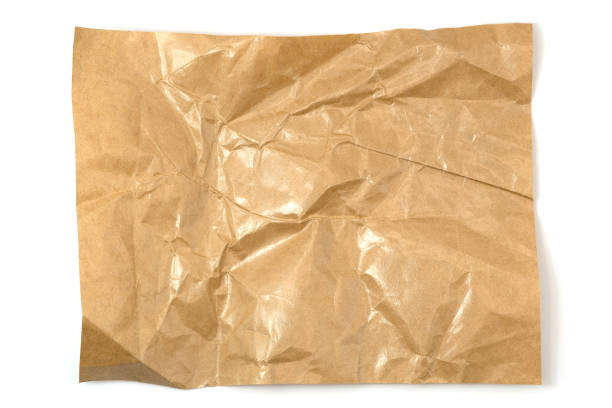 istock Brown crumpled paper isolated on white background 2129652717