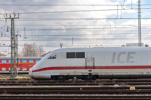 Frankfurt am main, Germany – March 03, 2024: Train parked on tracks with overhead wires
