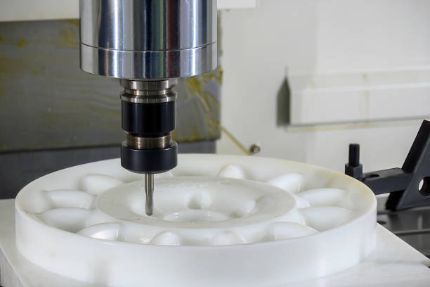 istock The CNC milling machine cutting the nylon parts with solid ball end mill tool. 2129685842