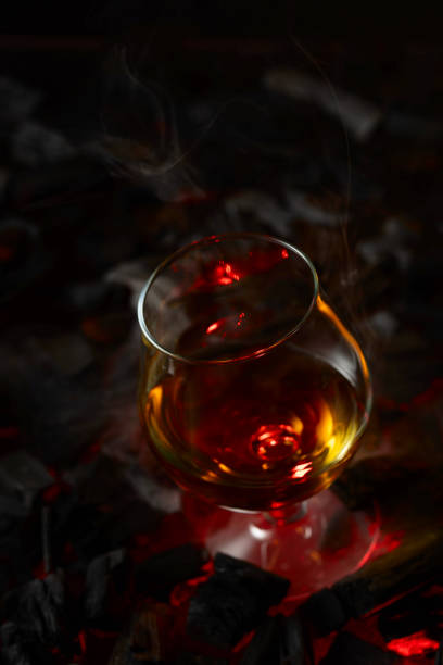 istock Snifter of brandy on a burning charcoal. 2129699080