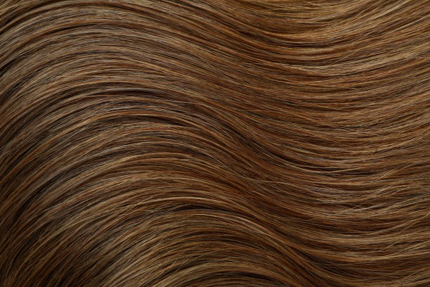 istock Dark female hair on whole background, close up 2129751722