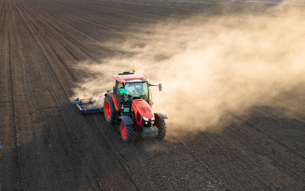 istock Tractor preparing the land for a new crop planting 2129769036