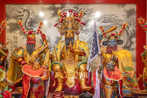 Vihara Gunung Timur Temple, Medan, Sumatra, Indonesia - January 16th 2024: Figures on an altar in the Chinese Buddhist - Confucian temple just before the Chinese new year