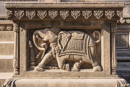 Beautiful stone carving of an elephant at Maheshwar temple situated on the banks of Narmada river, Madhya Pradesh, India.
