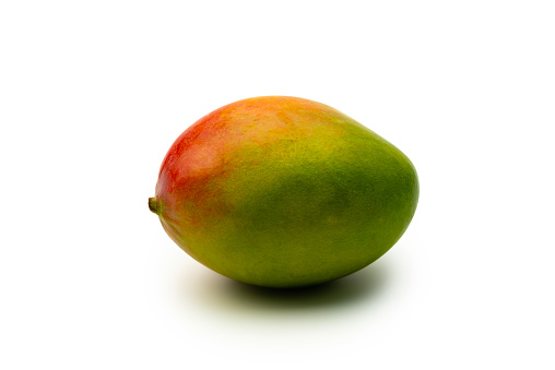 One Mango isolated on a white background.
 Studio shot.