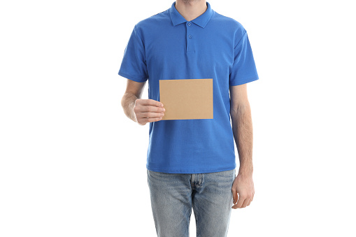 Man in blank blue polo isolated on white background
