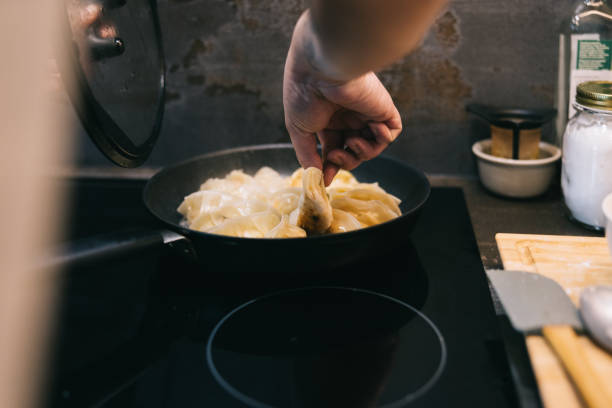 istock Frying homemade gyozas at home 2129834266