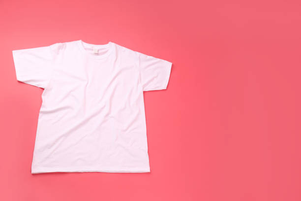 istock Blank white t-shirt with space for print on pink background 2129835389