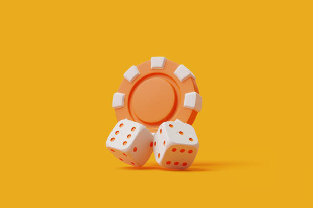 istock Casino Chip and Dice on Orange Background 2129849203