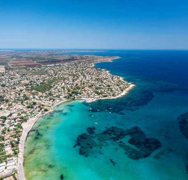 istock White sand beach near Syracuse in Sicily. 2129856702