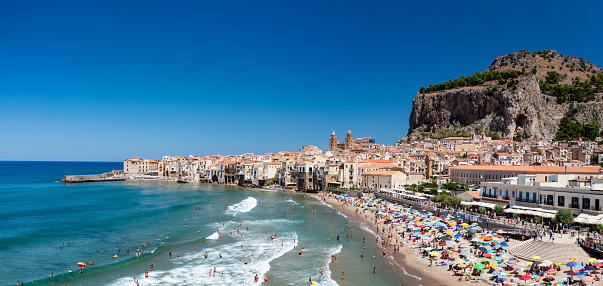 Sunny view of the stunning city of Cefalu on the island of Sicily, Italy