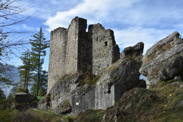istock Schalun Castle, Tight Frame, High Contrast, with Partly Cloudy Sky 2129894228
