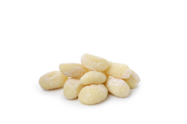 istock Raw potato gnocchi isolated on white background 2129894756