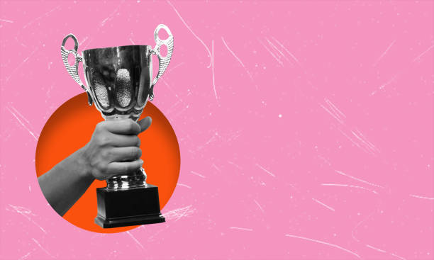 istock Modern art collage, champion cup on pink background with copy space. 2129907740