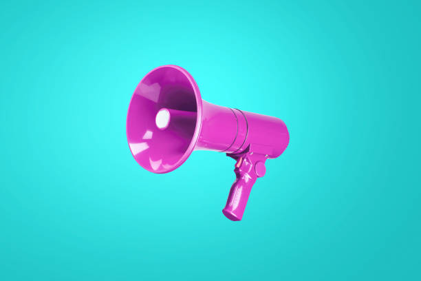 istock Beautiful colored pink megaphone on a cold blue background. A combination of complimentary colors. Advertising and message concept 2129927830